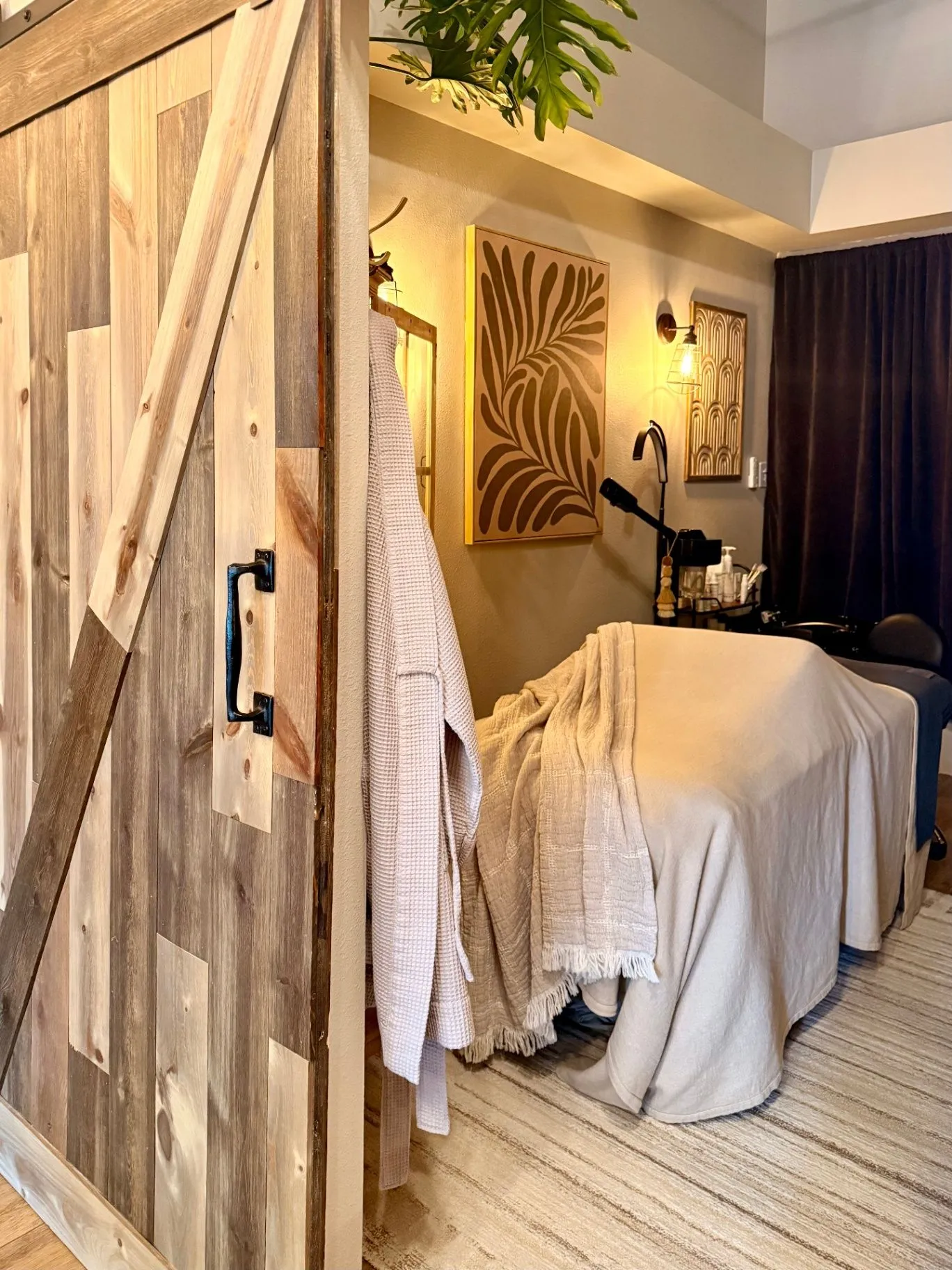 Treatment room with massage bed at Pure Skin Esthetic