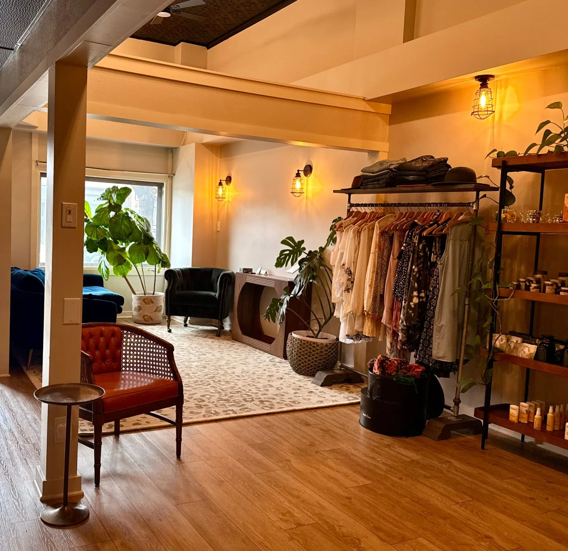 Pure Skin Esthetic studio with orange chair and retail clothing